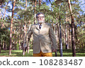 Funny old man with a stick. 108283487