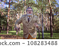 Funny old man with a stick. 108283488