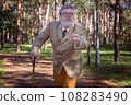 Funny old man with a stick. 108283490