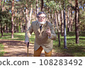 Funny old man with a stick. 108283492