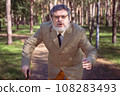 Funny old man with a stick. 108283493