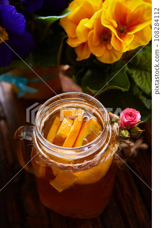 Ginger tea with orange, spices and honey. Ginger tea with orange, spices and honey. 108284112