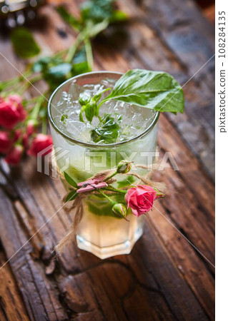 fresh mojito on a rustic table fresh mojito on a rustic table 108284135