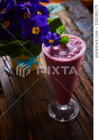 Delicious berry smoothie on table 108284175