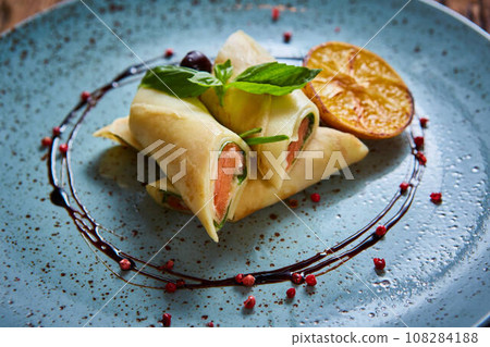 Crepes with smoked salmon Crepes with smoked salmon 108284188