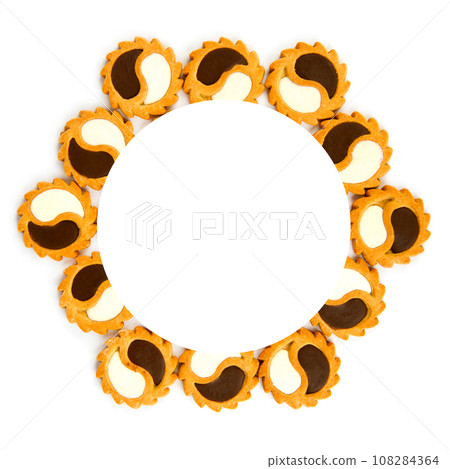 Cookies with dark and white chocolate isolated on a white . Beautiful pattern. Free space for text. Cookies with dark and white chocolate isolated on a white . Beautiful pattern. Free space for text. 108284364