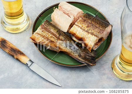 Smoked trout salmon and beer. 108285875