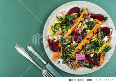 Stewed vegetables and chard leaves, copy space. Stewed vegetables and chard leaves, copy space. 108285882