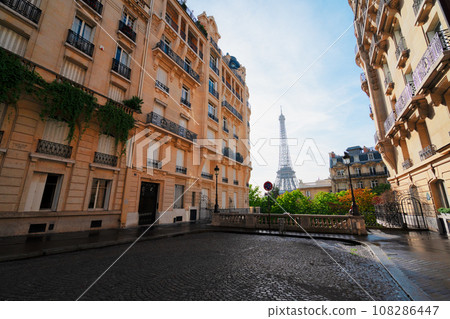 eiffel tour and Paris street 108286447