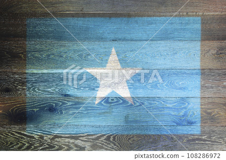Somalia flag on rustic old wood surface background Somalia flag on rustic old wood surface background 108286972