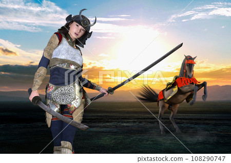 A female warrior and horse intercepting the enemy in battle 108290747