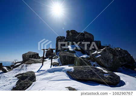 Gojo stone at the summit of Mt. Kinpu in winter 108290767