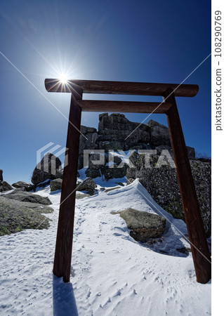 Gojo stone at the summit of Mt. Kinpu in winter 108290769