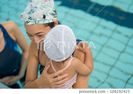 Baby swimming Baby swimming 108292425