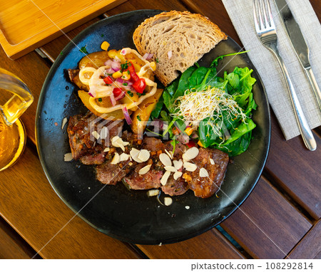 Portion of roasted veal with vegetables Portion of roasted veal with vegetables 108292814