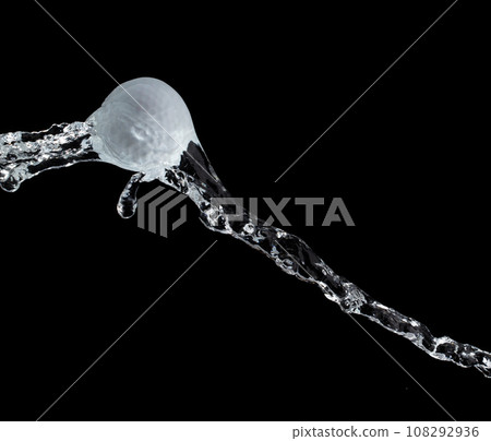 Golf ball hit water and splash in air. Golf ball fly in rain and splatter spin splash in droplet water. Black background isolated freeze action Golf ball hit water and splash in air. Golf ball fly in rain and splatter spin splash in droplet water. Black background isolated freeze action 108292936