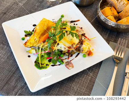 Tarte with vegetables and buffalo mozzarella Tarte with vegetables and buffalo mozzarella 108293442