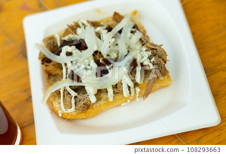 Delicious meat Spanish appetizer is sandwiche with lamb Delicious meat Spanish appetizer is sandwiche with lamb 108293663