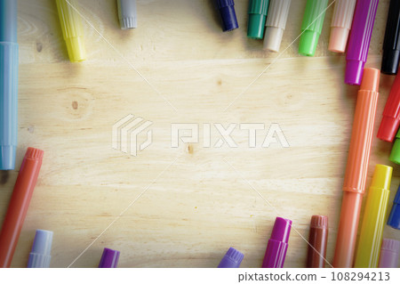 Colorful pen on wooden table background with space. Colorful pen on wooden table background with space. 108294213