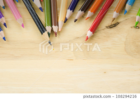 Colorful pencils on wooden table background with space. 108294216