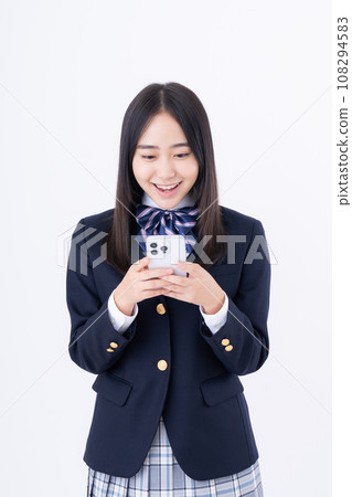 High school girl with a smartphone 108294583