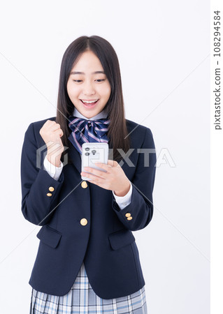 High school girl with a smartphone 108294584