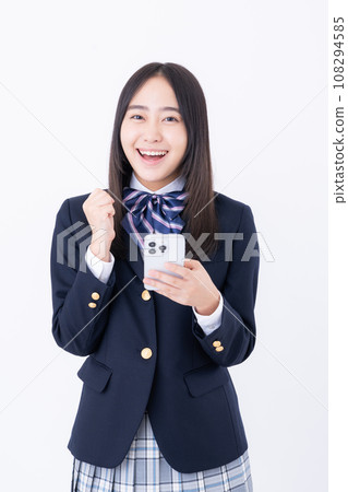 High school girl with a smartphone 108294585