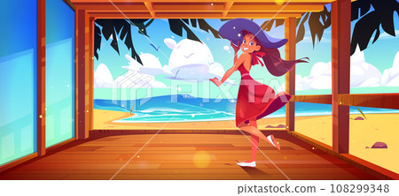 Happy woman standing on beach house porch Happy woman standing on beach house porch 108299348