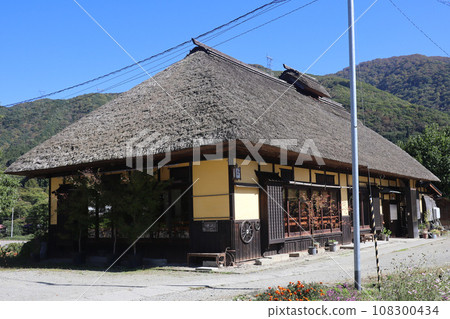 A house with a roofed roof A house with a roofed roof 108300434