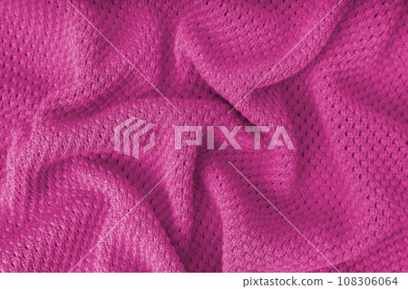 Pink crumpled knitting wool texture background. 108306064