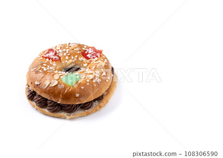 Individual Epiphany cake roscon de reyes isolated on white background Individual Epiphany cake roscon de reyes isolated on white background 108306590