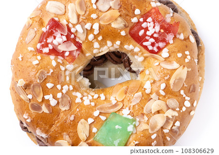 Individual Epiphany cake roscon de reyes with cream stuffed isolated on white background 108306629