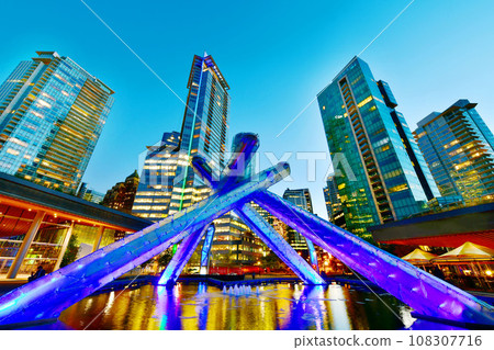 Beautiful view of Vancouver skyline with harbor at sunset, British Columbia, Canada Beautiful view of Vancouver skyline with harbor at sunset, British Columbia, Canada 108307716