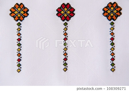 Slavic cross stitch by colored threads. Design of ethnic pattern. Background with Embroidery Texture 108309271