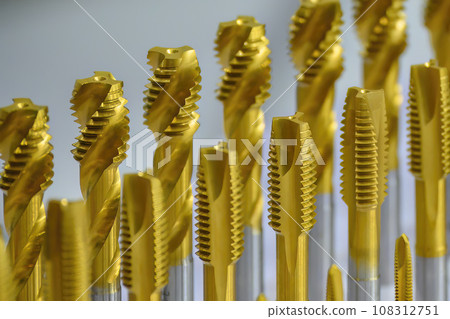 Close up group of special coating tap tool. Close up group of special coating tap tool. 108312751