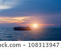 speed boat on the sea with sunset sky background. 108313947