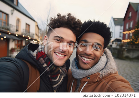 Interracial friends or LGBTQIA gay couple on winter Christmas Europe trip 108314371