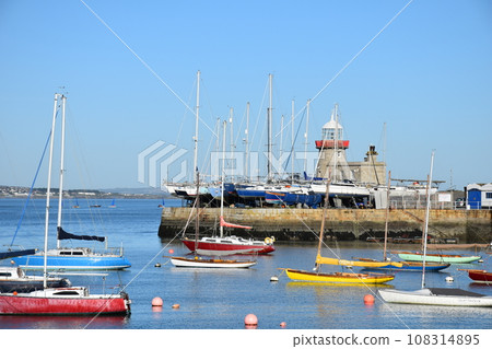Ireland Howth lighthouse and yacht harbor Ireland Howth lighthouse and yacht harbor 108314895