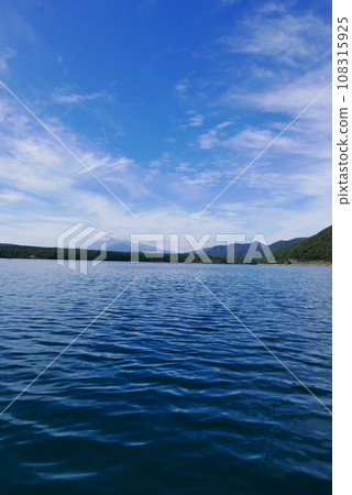 Kayak and canoe at Lake Saiko near Mt. Fuji. The calm water surface is calm and pleasant. Kayak and canoe at Lake Saiko near Mt. Fuji. The calm water surface is calm and pleasant. 108315925