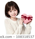 Girl holding a heart-shaped Valentine chocolate box with an AI-generated ribbon Girl holding a heart-shaped Valentine chocolate box with an AI-generated ribbon 108318537