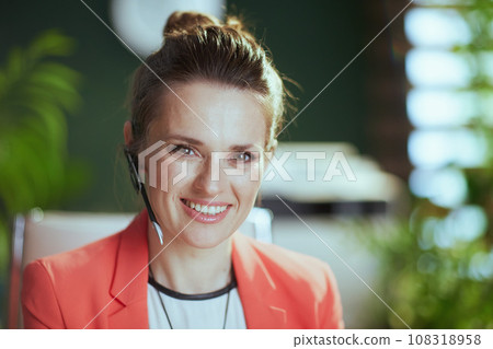 Portrait of smiling modern business woman at work 108318958