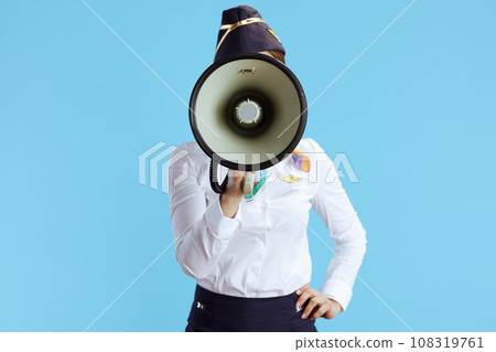 stylish flight attendant woman on blue in uniform stylish flight attendant woman on blue in uniform 108319761