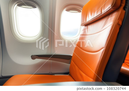 economy class seat on an airplane 108320744