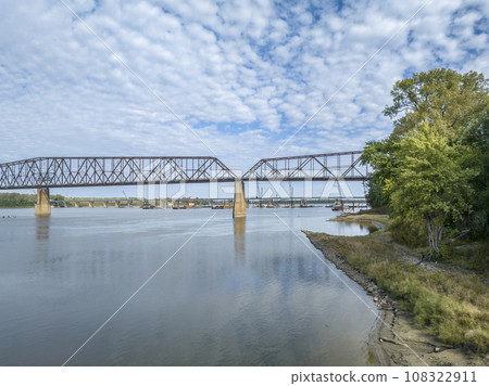 Chain of Rocks on the Mississippi River above St Louis the old historic bridge and the new bridge with construction work 108322911