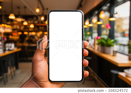 Mockup of Smartphone with White Screen in Male Hands in Cozy Coffee Shop or Boutique App Advertising Mockup of Smartphone with White Screen in Male Hands in Cozy Coffee Shop or Boutique App Advertising 108324572