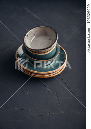 Stack of plates and bowls 108326009