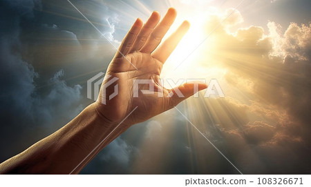 A man's hand reaches for the light in the clouds 108326671