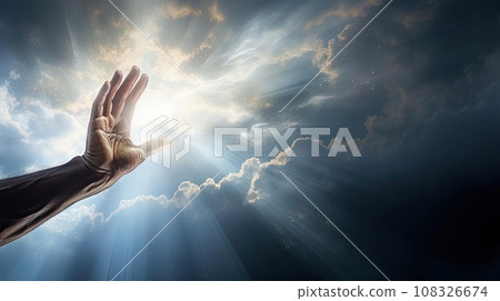A man's hand reaches for the light in the clouds 108326674