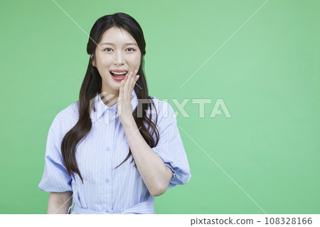 Green Consumer_Picture of a korean asain beautiful woman with her hand on one cheek 108328166