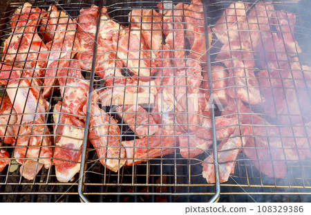 Kebabs are traditional Turkish dishes, cooked on a charcoal grill over hot flame 108329386